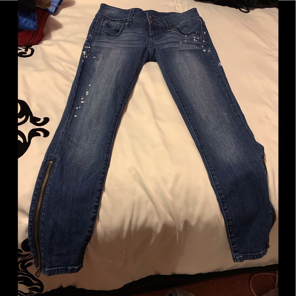 Bebe paint splattered jeans with slight rips